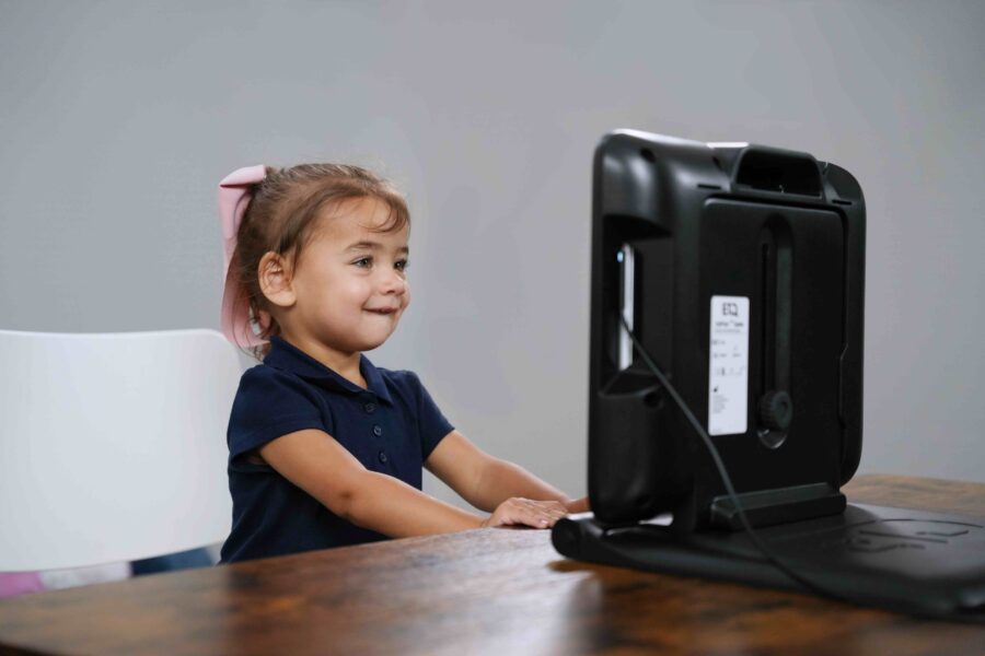 Child using a device.